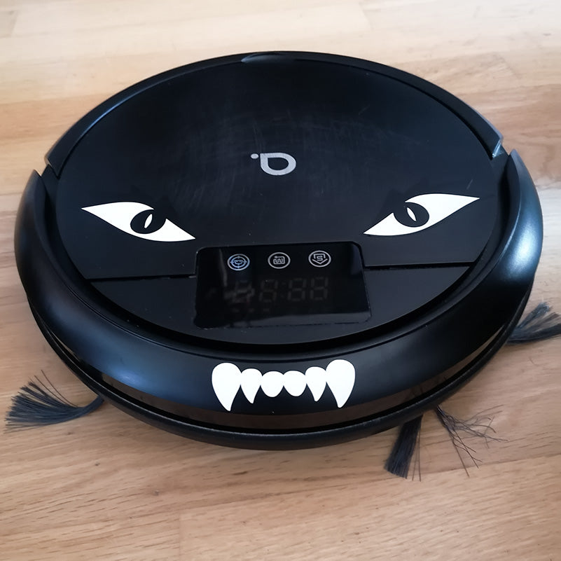 Robotdammsugare med ögon och huggtänder från Kulform
