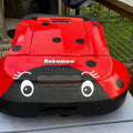 A mower turned into a ladybug with dots and white eyelashes from Kulform