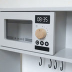 Silltrut med extra detaljer till mikrovågsugnen - display och knappar.