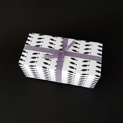 Nice and fun Christmas gift with wrapping paper in the lutefisk pattern