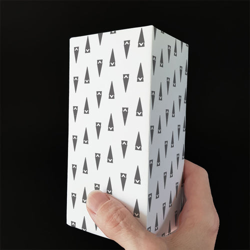 Gift with wrapping paper featuring small elves